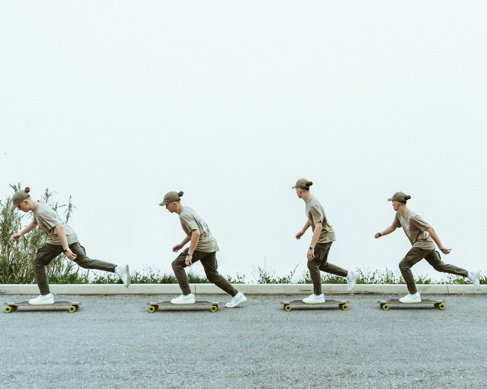 Youth moving forward on a skateboard path